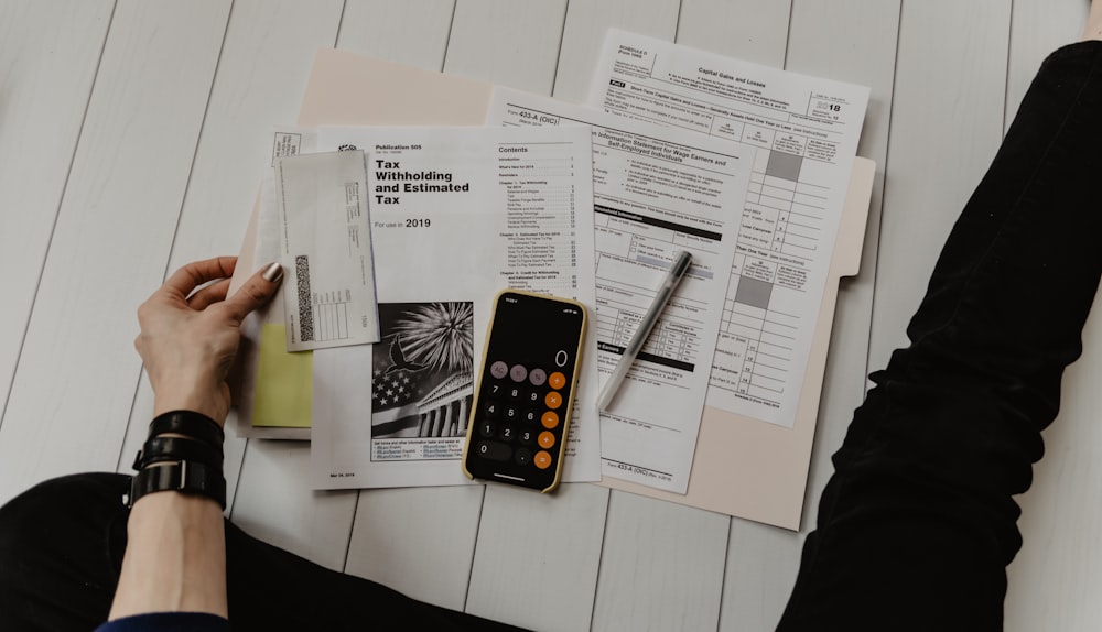 Calculator and home-loan paperwork
