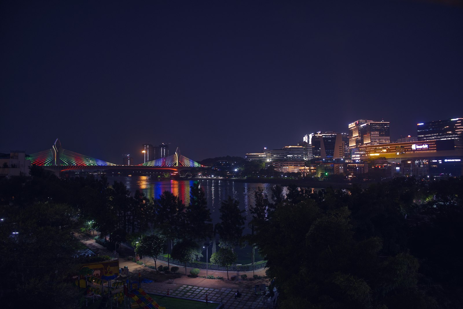 Hyderabad Financial District skyline and Durgam Cheruvu bridge at night